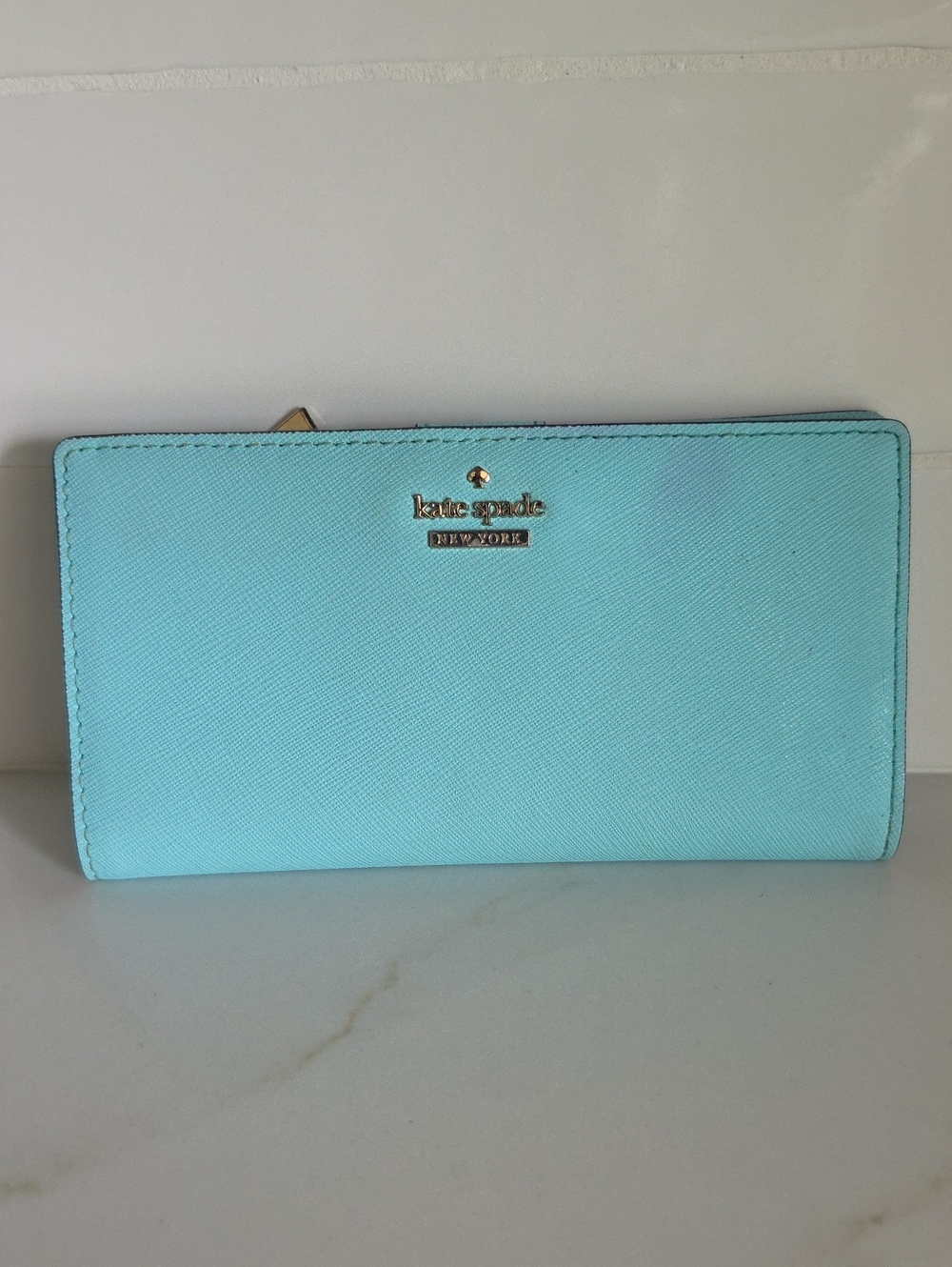 kate spade aqua zip-around continental wallet
